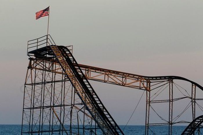 The American Flat hoisted over a tower